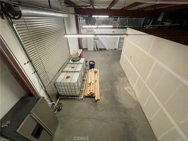 RV Garage Door and water tanks
