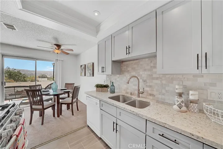 Upgraded Kitchen is light and bright.