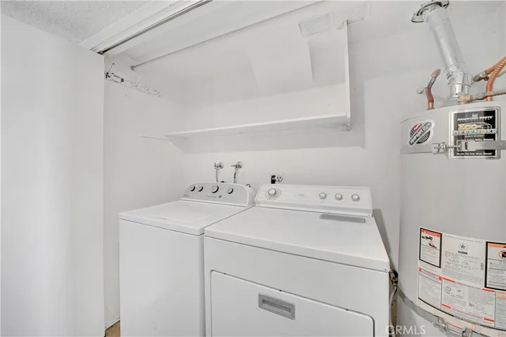 Laundry room in the hallway.