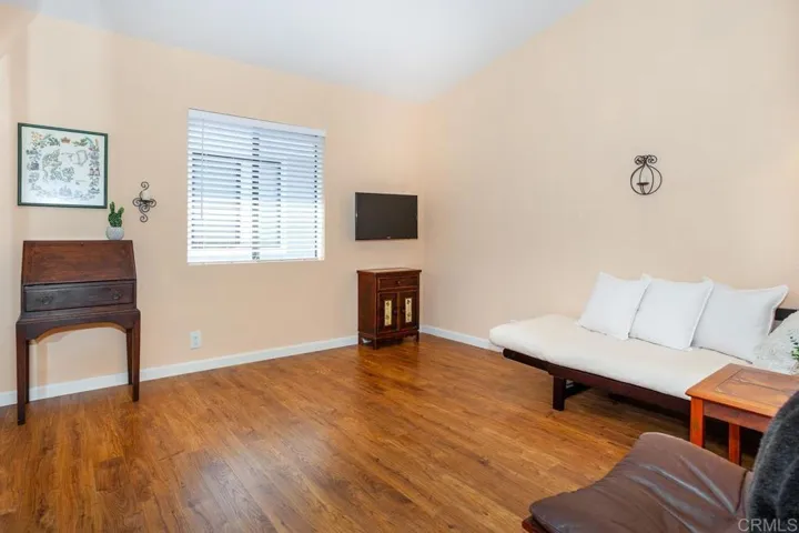 Spare bedroom feature the laminent floor and large closet!