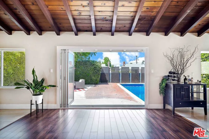 natural light is abundant as you walk from living to outdoors