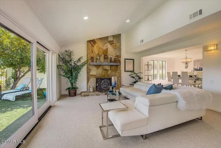 Living Room w Soaring Stone Fireplace