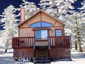 Winter Exterior with stairs and deck