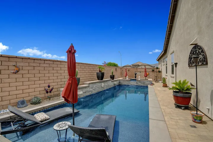POOL AND SPA WITH TANNING SHELF MLS