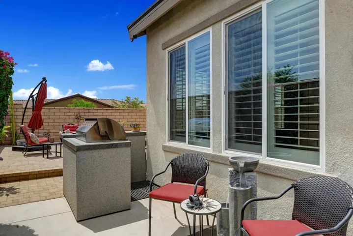 BACK PATIO TO BUILT IN BBQ MLS