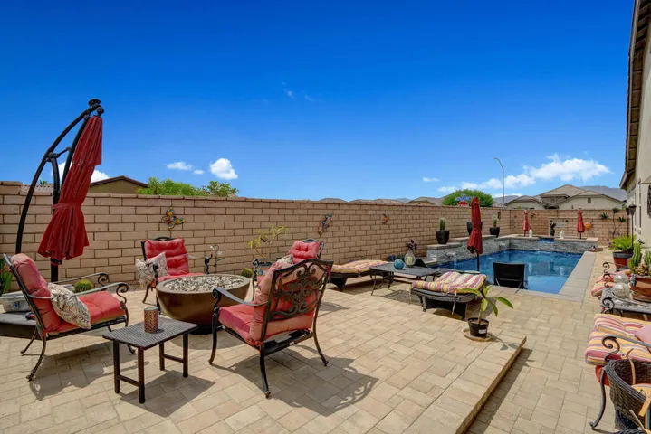 RAISED FIRE PIT PATIO TO POOL AND SPA ML