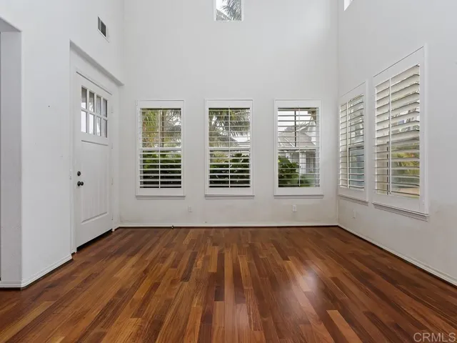 Living room looking toward front of house/front door.