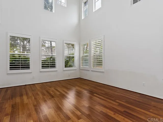 Vaulted ceilings and many windows give this room an elegant feel.