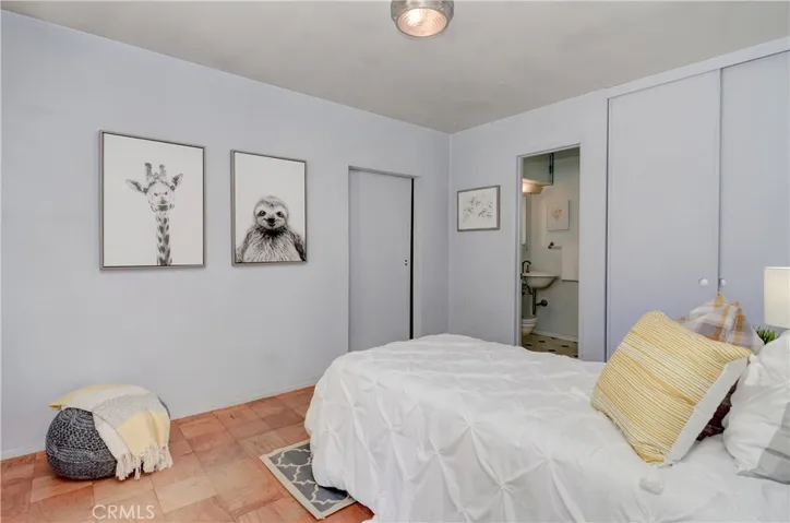 Ensuite bedroom has two closets and has flexibility for master, guests or in-law options.