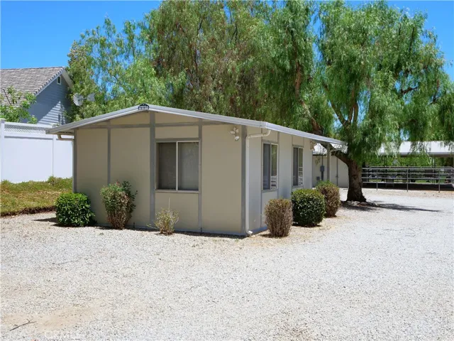 300 sq ft  ADU with 1/2 bath and AC.  Currently used as an office.  Could be music or art studio, guest suite or a great spot to homeschool.