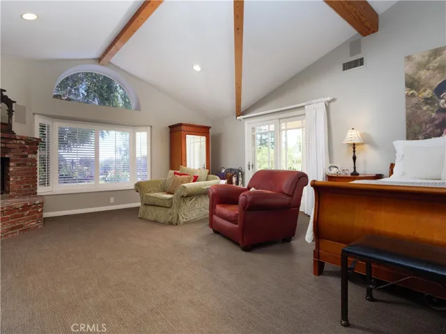 High Ceilings, Picture windows with a view of the canyon, sliders out to the pool.