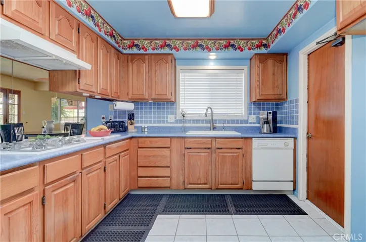 Any cook will love this kitchen....a window at the sink!  Easy access to garage and laundry area too.