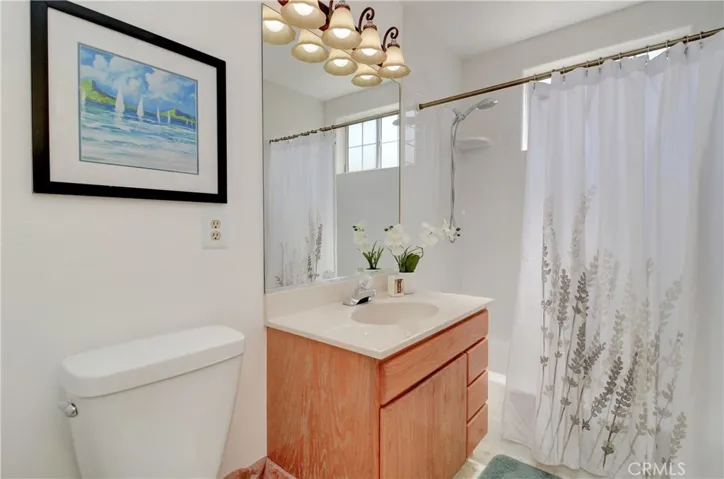 Roomy hall bath sparkles.