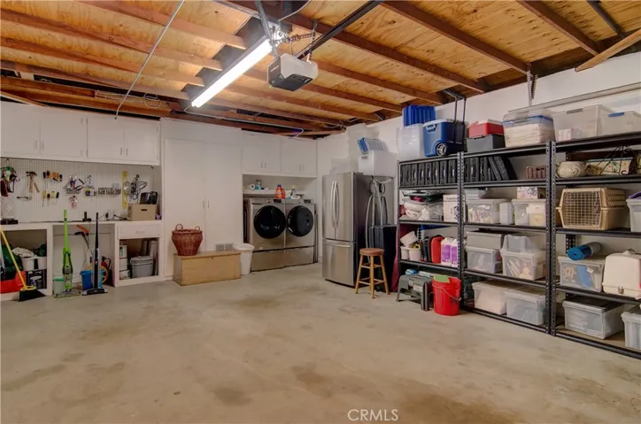 Sooooo much storage and space in this immaculate, oversize garage.
