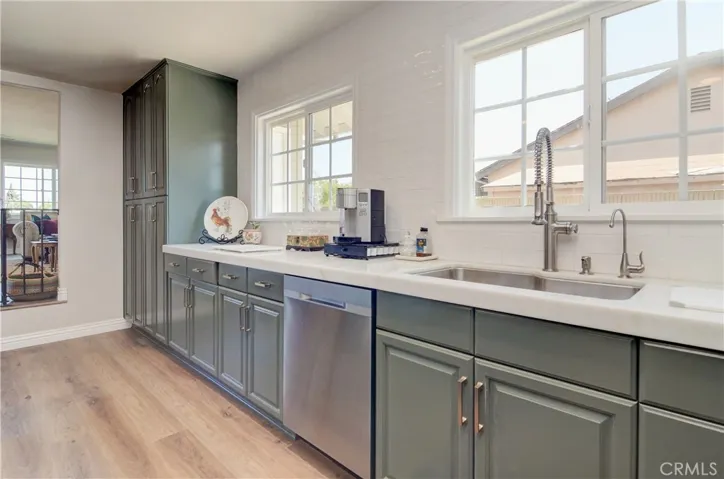 Loads of everything! ...counter space, cabinet space and gorgeous natural light.