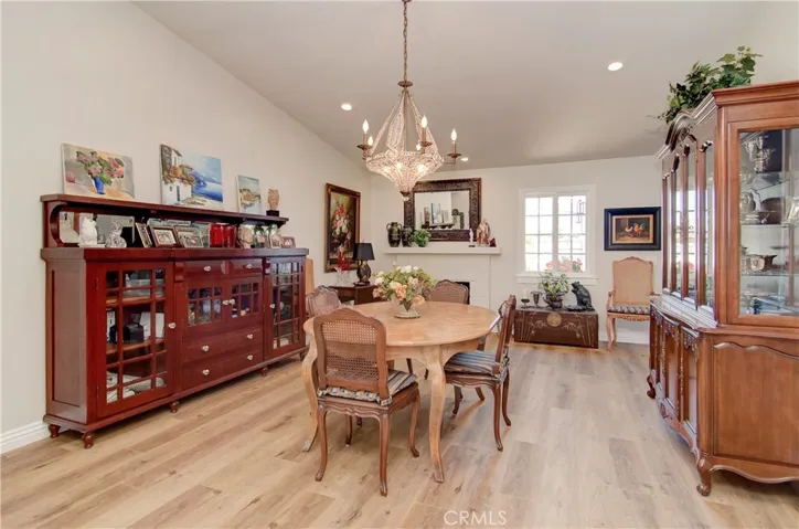 Sooooo many quality upgrades here...high end vinyl plank flooring allows for a seemless flow throughout the spaces and makes them seem even larger...this is a awesome spot with vaulted ceiling, fireplace and room for any furniture arrangement.