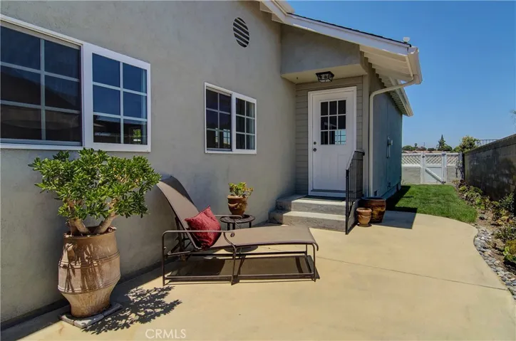 Bonus side yard is accessed by kitchen/great room and is a private getaway for relaxing, sunning or napping...gardeners welcome too!