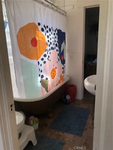 Bathroom with claw tub and shower