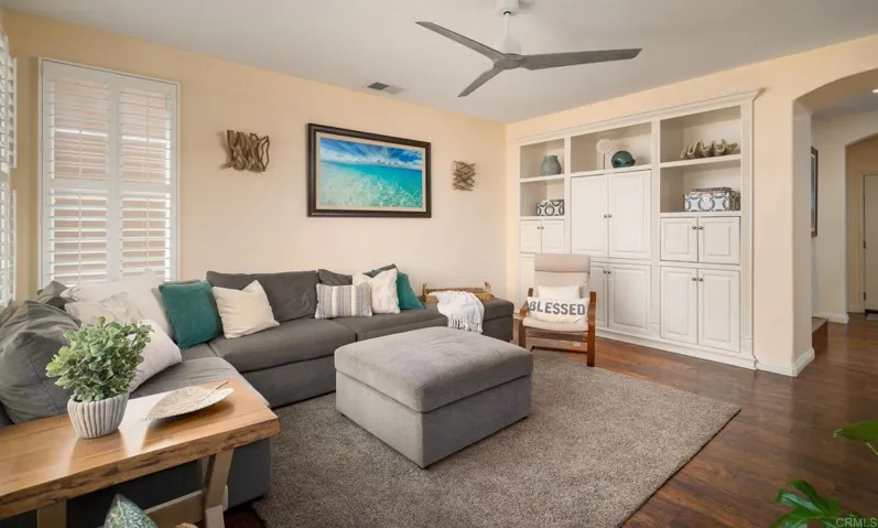Built in cabinetry makes it easy to keep your family space free of clutter.