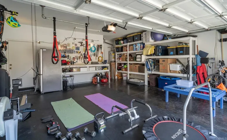Workbench, built in storage and partial gym flooring