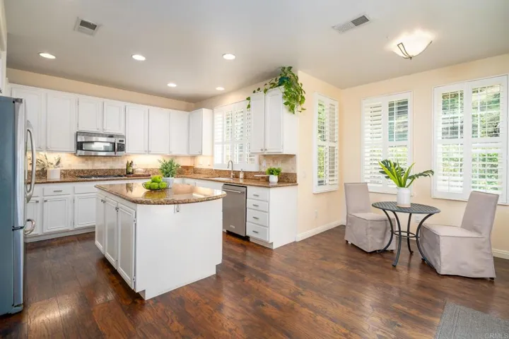 This light and bright kitchen has plenty of space for entertaining.