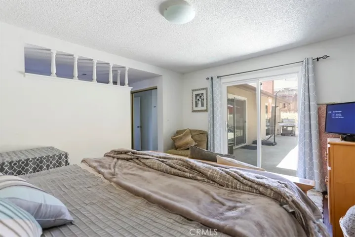 Master bedroom also has slider to the backyard.