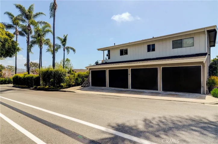 Lower, rear unit in well maintained Mid Century three unit property.