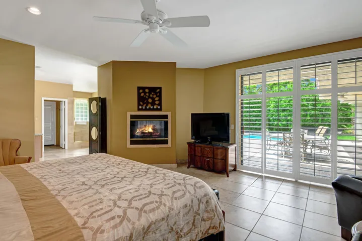 PRIMARY BED FIREPLACE AND POOL VIEW MLS
