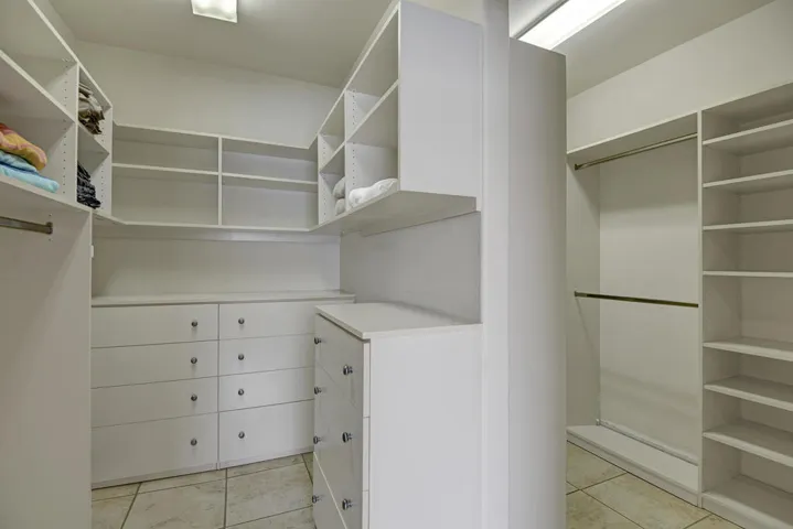PRIMARY BEDROOM WALK IN CLOSET MLS