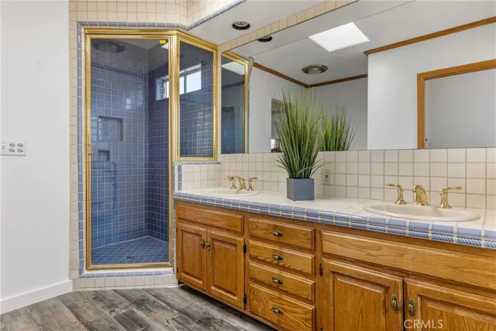 Master bath has a separate shower and tub