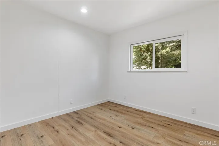 3 of 3 bedrooms. There are 2 bedrooms downstairs, and the grand master suite is upstairs.