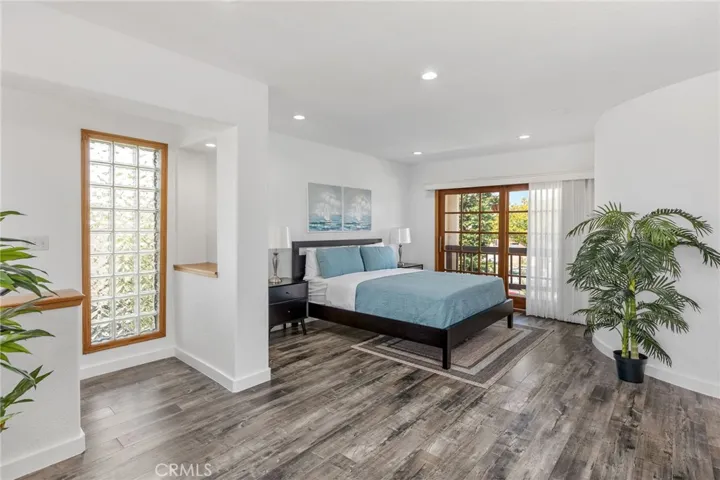 Spacious primary bedroom with sitting area