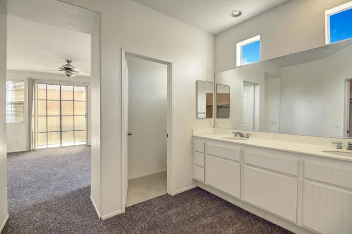 MAIN BEDROOM BATHROOM REVERSE.jpg mls