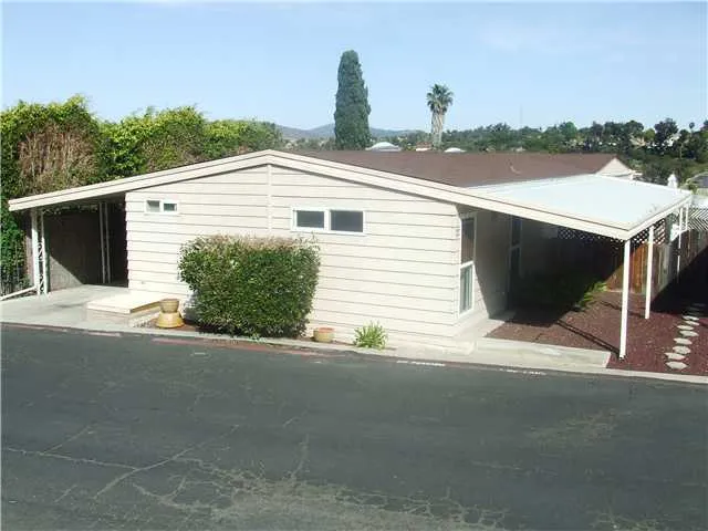 Curb appeal from terraced view above.