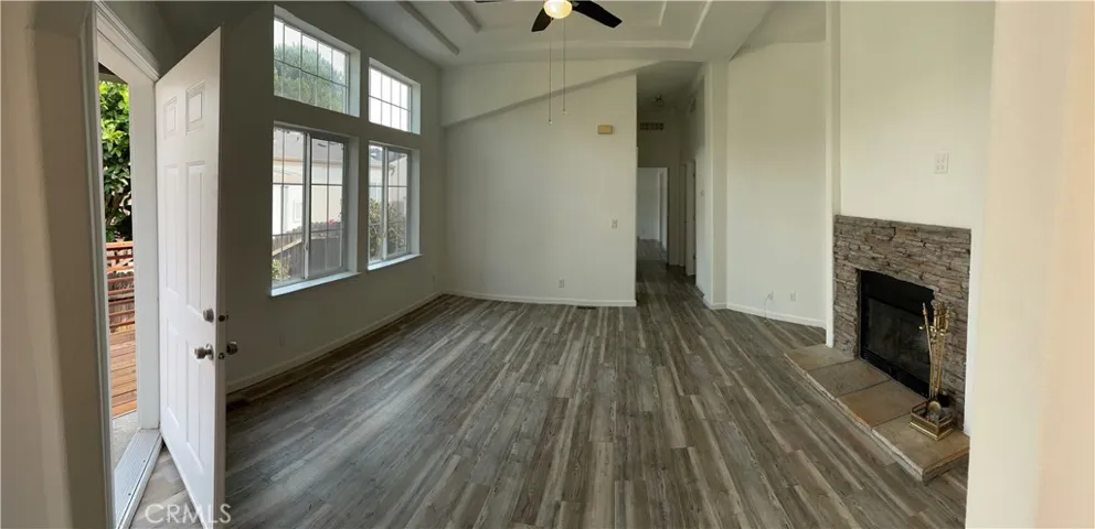 Living Room - Fireplace & High Ceilings