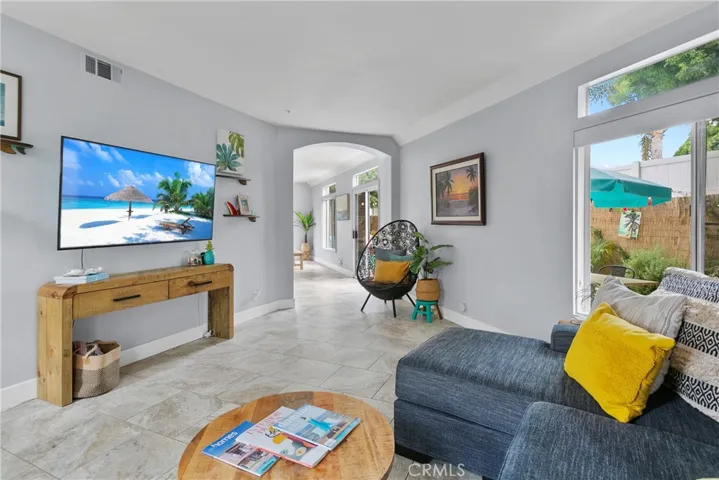 Multiple sliders and clerestory windows provide loads of natural light.