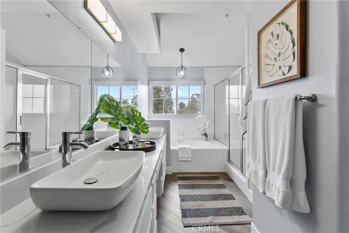 Incredible master bath with dual sink vanity, separate soaking tub and GIANT shower.