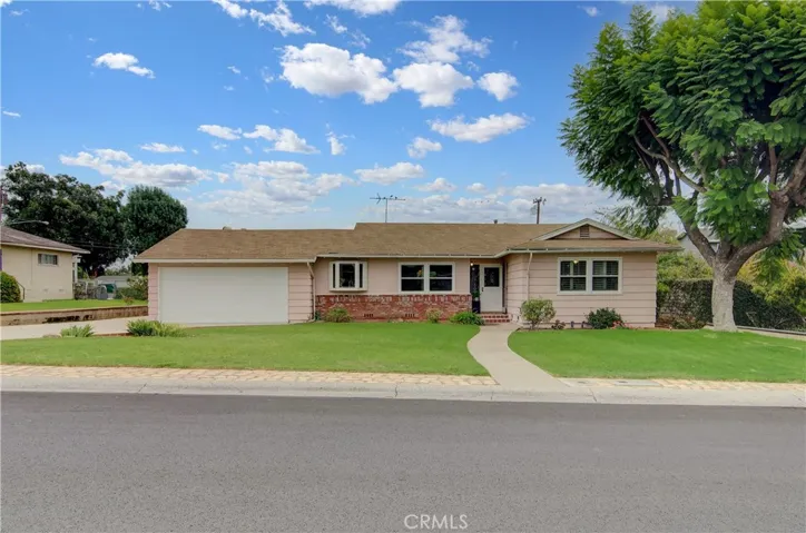 Nice set-back, large front yard, extra-long driveway, combine to create great curb appeal.