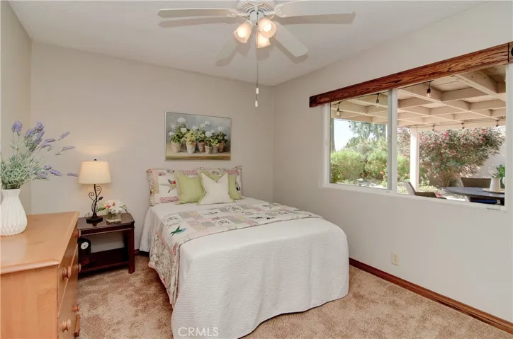 Plenty of room for sleep, study and play in this large kids/guest room.