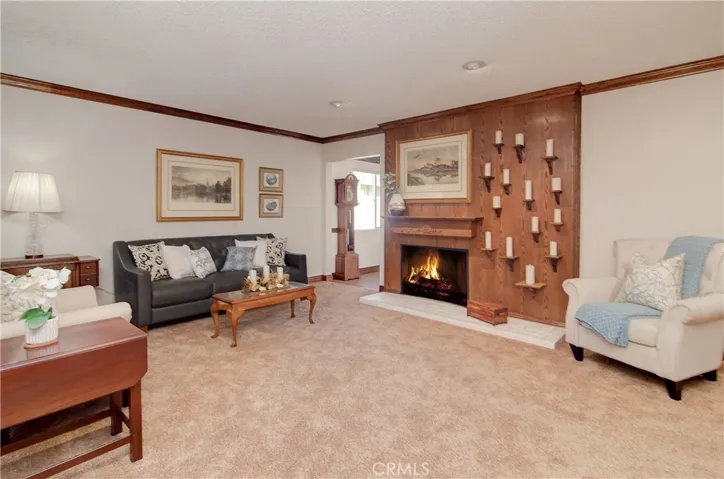 Lovely fireplace with custom mantle wall is a great spot to cozy up to on cool beach nights.
