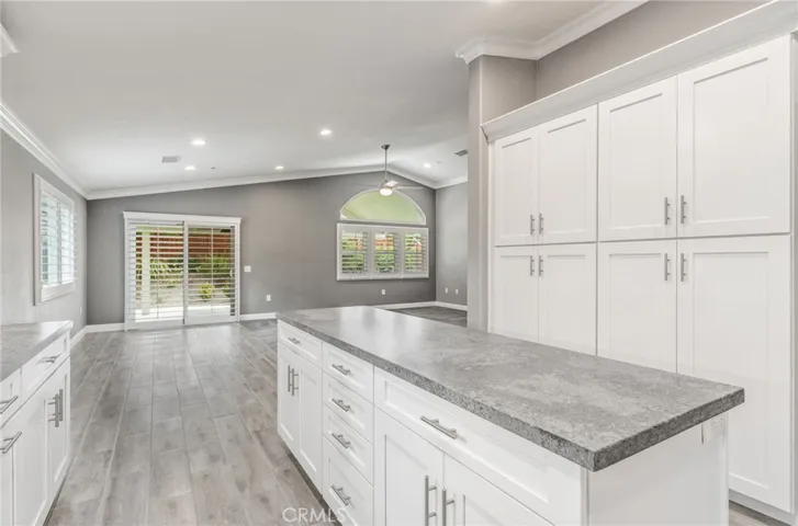 Conveniently open to the family room and easy access to patio