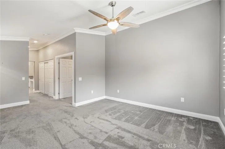 plus a thoughtful dressing hall for "his" and "hers" closets!