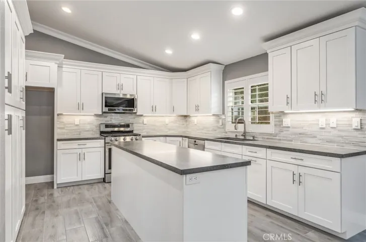 Chef's kitchen with lots of cabinets and deep "Blanco" granite sink