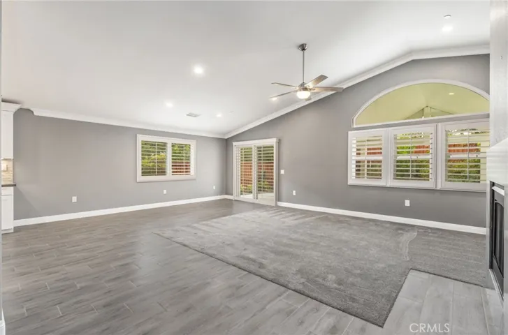 Family room has Glass sliders to back patio