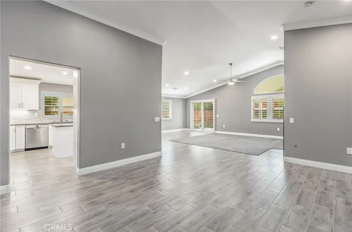 Kitchen to the left,  dining room to the right and family room straight ahead