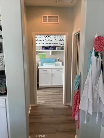 Separate Laundry Room past pantry entry
