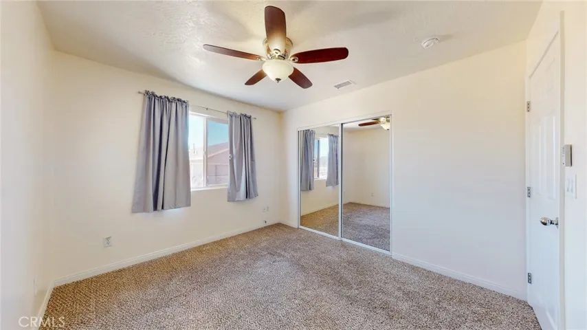 Closet in this room is deceiving because it is deep on the right side once opened