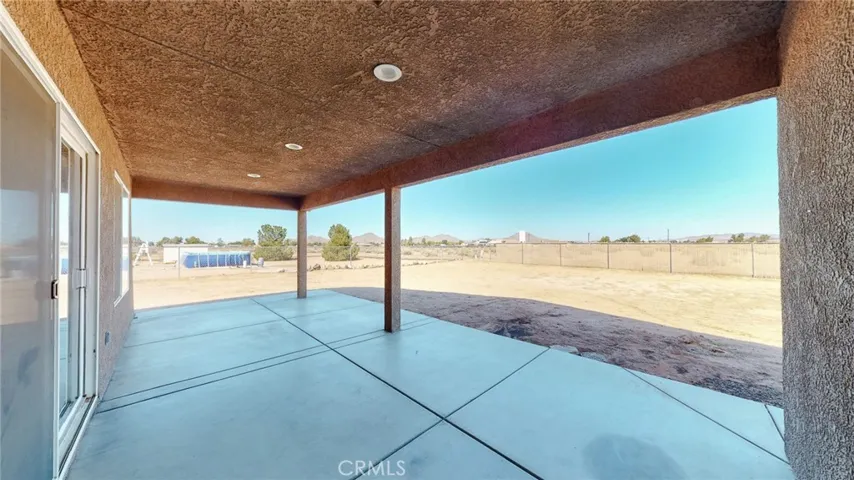 This is a large lot with expansive backyard that is a blank canvas.  Lots of possibilities.