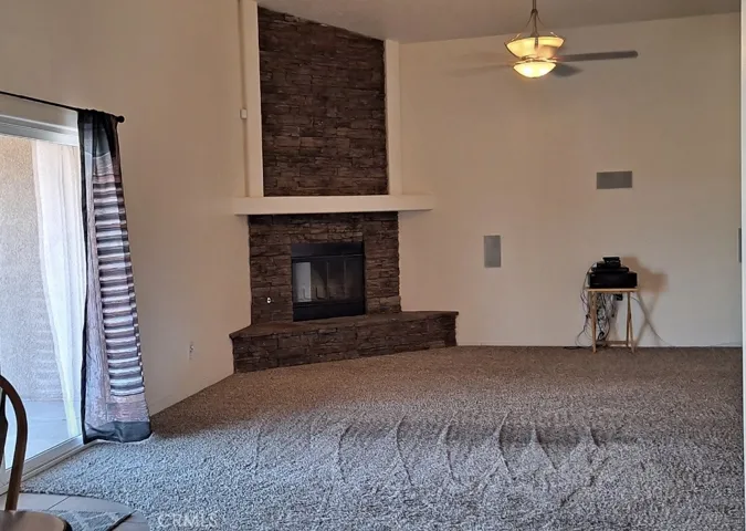 2 Ceiling Fans and recessed mounted speakers in ceilings and wall