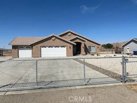 New fencing that surrounds entire property